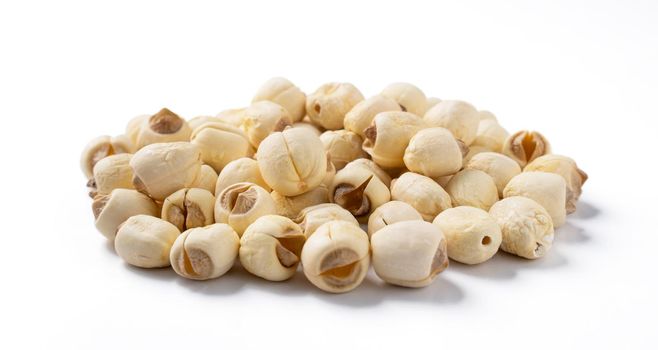 Close up of dried lotus seed Chinese herbal healthy food isolated on white table background