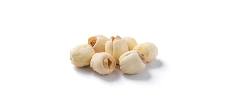 Close up of dried lotus seed Chinese herbal healthy food isolated on white table background