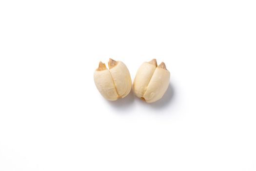 Close up of dried lotus seed Chinese herbal healthy food isolated on white table background