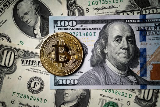 Business top view design concept of cryptocurrency bitcoin with USD Dollar paper currency money over dark black table background.
