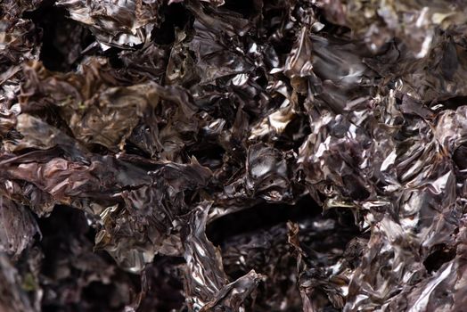 Close up of dried seaweed sheet healthy food isolated on white table background
