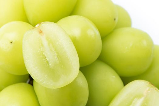 Close up of beautiful a bunch of Shine Muscat green grape isolated on white background, clipping path cut out.
