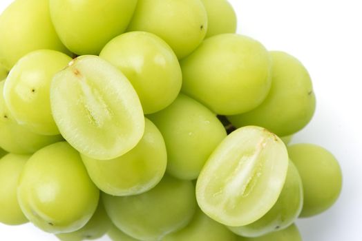Close up of beautiful a bunch of Shine Muscat green grape isolated on white background, clipping path cut out.