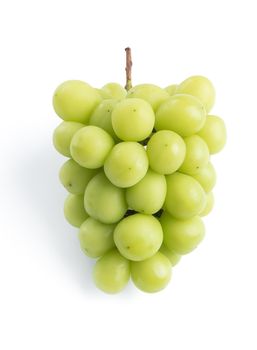 Close up of beautiful a bunch of Shine Muscat green grape isolated on white background, clipping path cut out.