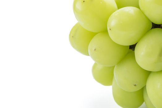 Close up of beautiful a bunch of Shine Muscat green grape isolated on white background, clipping path cut out.