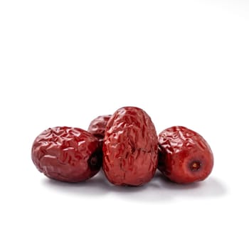 Close up of Chinese red dates (jujube) isolated on white background with clipping path.