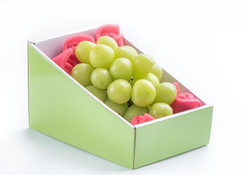 Close up of beautiful boxed Shrine Muscat green grape isolated on white background, clipping path cut out.