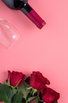 Valentine's Day dating gift with wine and rose concept on pink background design concept