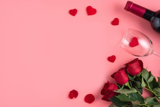 Valentine's Day dating gift with wine and rose concept on pink background design concept