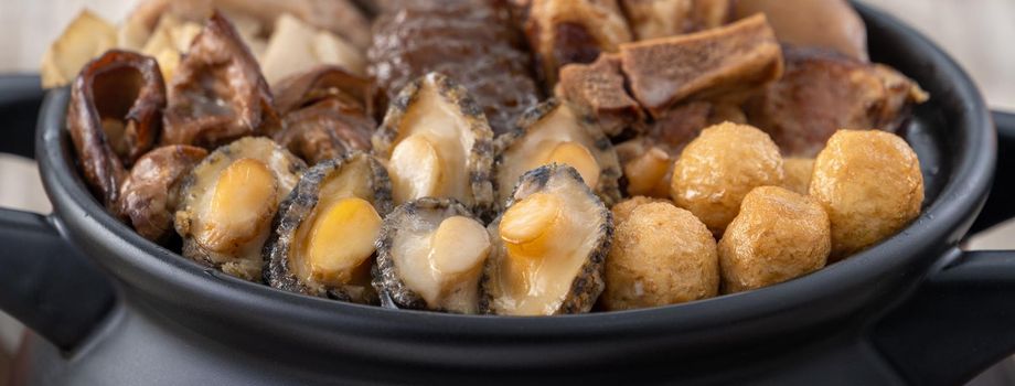 Traditional food of Chinese lunar new year, Buddha jumps over the wall, Chinese Soup Casserole dish, Buddha's Temptation, named Fo Tiao Qiang, close up.