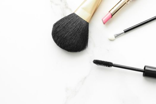 Make-up and cosmetics products on marble, flatlay background - modern feminine lifestyle, beauty blog and fashion inspiration concept