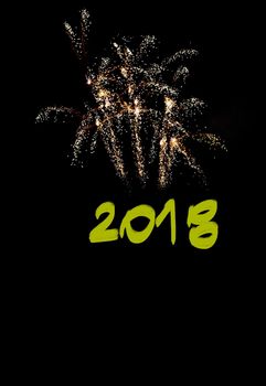 amazing fireworks in the black sky, with handwritten  2018, grand spectacle at the beginning of the new year, party