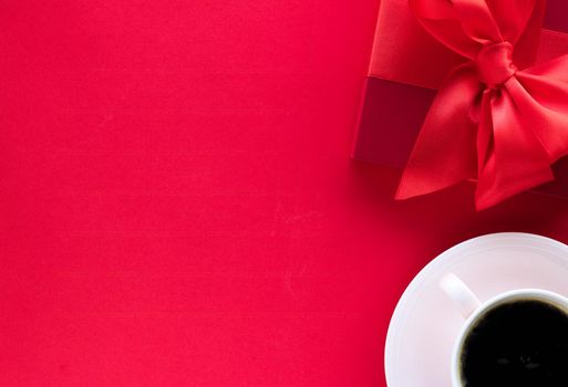 Romantic celebration, lifestyle and birthday present concept - Luxury beauty gift box and coffee on red, flatlay