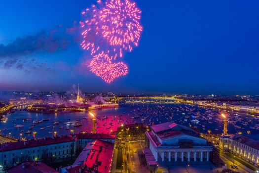 Festive salute over the Peter and Paul Fortress in a significant Victory Day for the country on May 9, improbable quantity of ships observes a show, an eternal flame of memory burns on rostral colons. High quality 4k footage