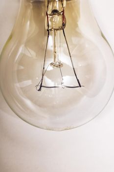 Glass bulb close up on a white background, copy space