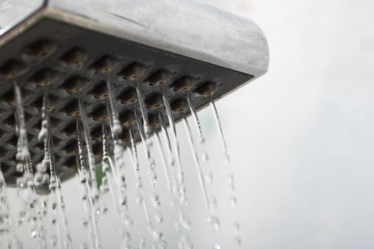 Close up of water drops from a shower, copy space