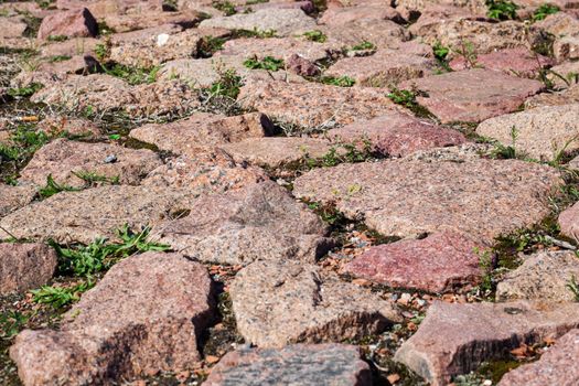 Large stones and moss between them, background and texture