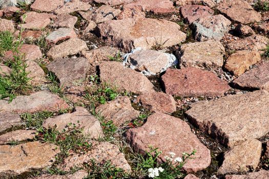 Large stones and moss between them, background and texture
