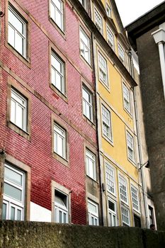 Beautiful and old colorful tiled facades in Porto city in January
