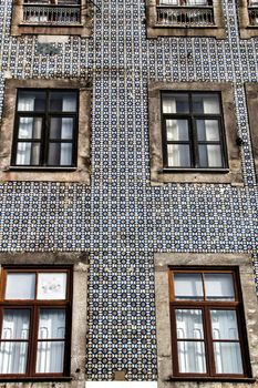 Beautiful and old colorful tiled facades in Porto city in January