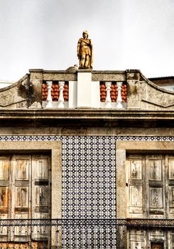 Beautiful and old colorful tiled facades in Porto city in January