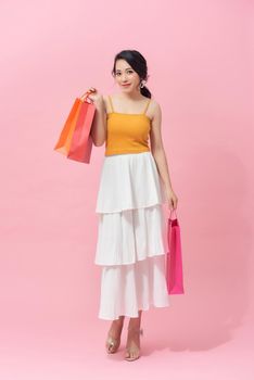 young woman with packages from shop