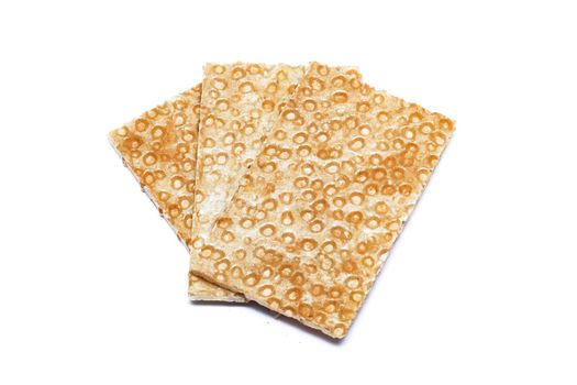 Crunchy loaves of bread, isolated on white background, healthy food