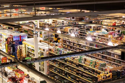 Belarus, Novopolotsk - July 10, 2019: Hall of the supermarket top view with people