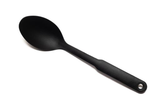 Kitchen black plastic scoop, isolated on a white background