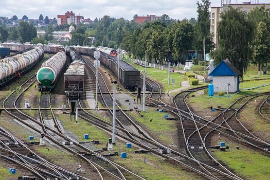 BELARUS, VITEBSK - JUNE 18, 2019: Rail tracks with trains close up