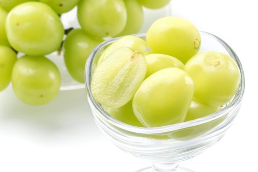 Close up of beautiful boxed Shrine Muscat green grape isolated on white background, clipping path cut out.