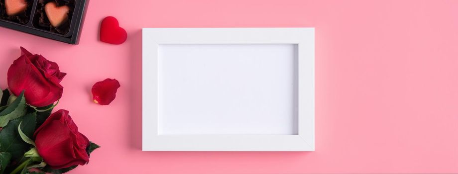 Valentine's Day memory with blank picture frame on pink background design concept