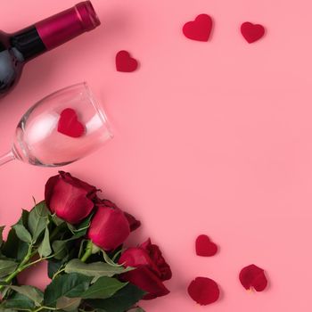 Valentine's Day dating gift with wine and rose concept on pink background design concept