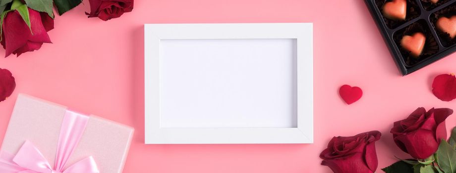 Valentine's Day memory with blank picture frame on pink background design concept