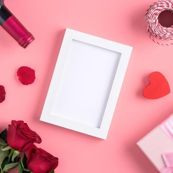 Valentine's Day memory with blank picture frame on pink background design concept