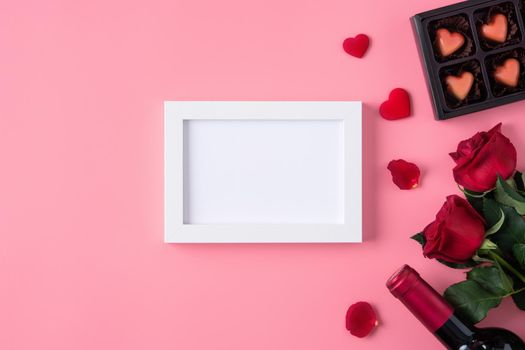 Valentine's Day memory with blank picture frame on pink background design concept