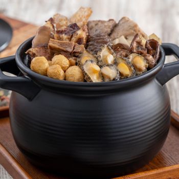 Traditional food of Chinese lunar new year, Buddha jumps over the wall, Chinese Soup Casserole dish, Buddha's Temptation, named Fo Tiao Qiang, close up.