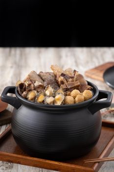 Traditional food of Chinese lunar new year, Buddha jumps over the wall, Chinese Soup Casserole dish, Buddha's Temptation, named Fo Tiao Qiang, close up.