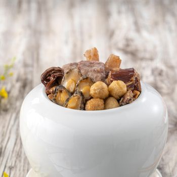 Traditional food of Chinese lunar new year, Buddha jumps over the wall, Chinese Soup Casserole dish, Buddha's Temptation, named Fo Tiao Qiang, close up.