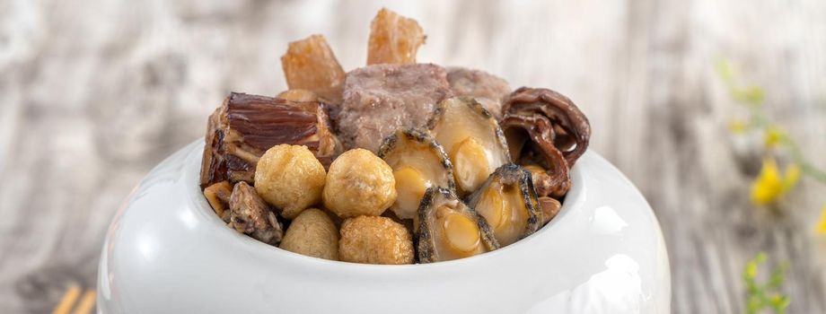 Traditional food of Chinese lunar new year, Buddha jumps over the wall, Chinese Soup Casserole dish, Buddha's Temptation, named Fo Tiao Qiang, close up.