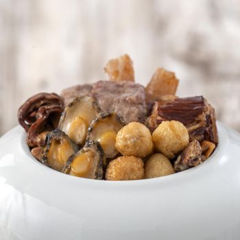 Traditional food of Chinese lunar new year, Buddha jumps over the wall, Chinese Soup Casserole dish, Buddha's Temptation, named Fo Tiao Qiang, close up.