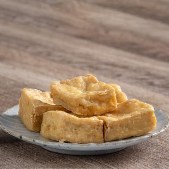 Deep fried stinky tofu, fermented bean curd with pickled cabbage vegetable, famous and delicious street food in Taiwan.