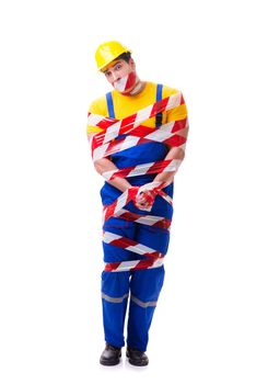 Funny worker wearing coveralls with tape