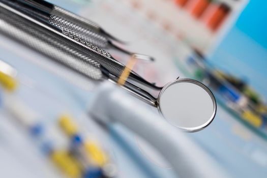 Dentist equipment on blue background