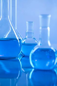 Laboratory beakers,Science experiment, blue background