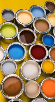 Group of tin metal cans with color paint