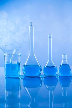 Laboratory equipment, glass filled background