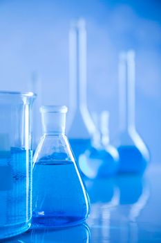 Laboratory equipment, glass filled background