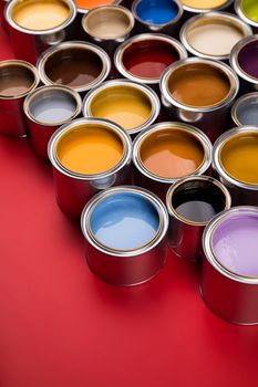 Group of tin metal cans with color paint