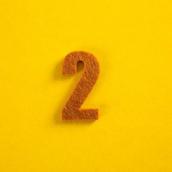 colorful number on yellow background